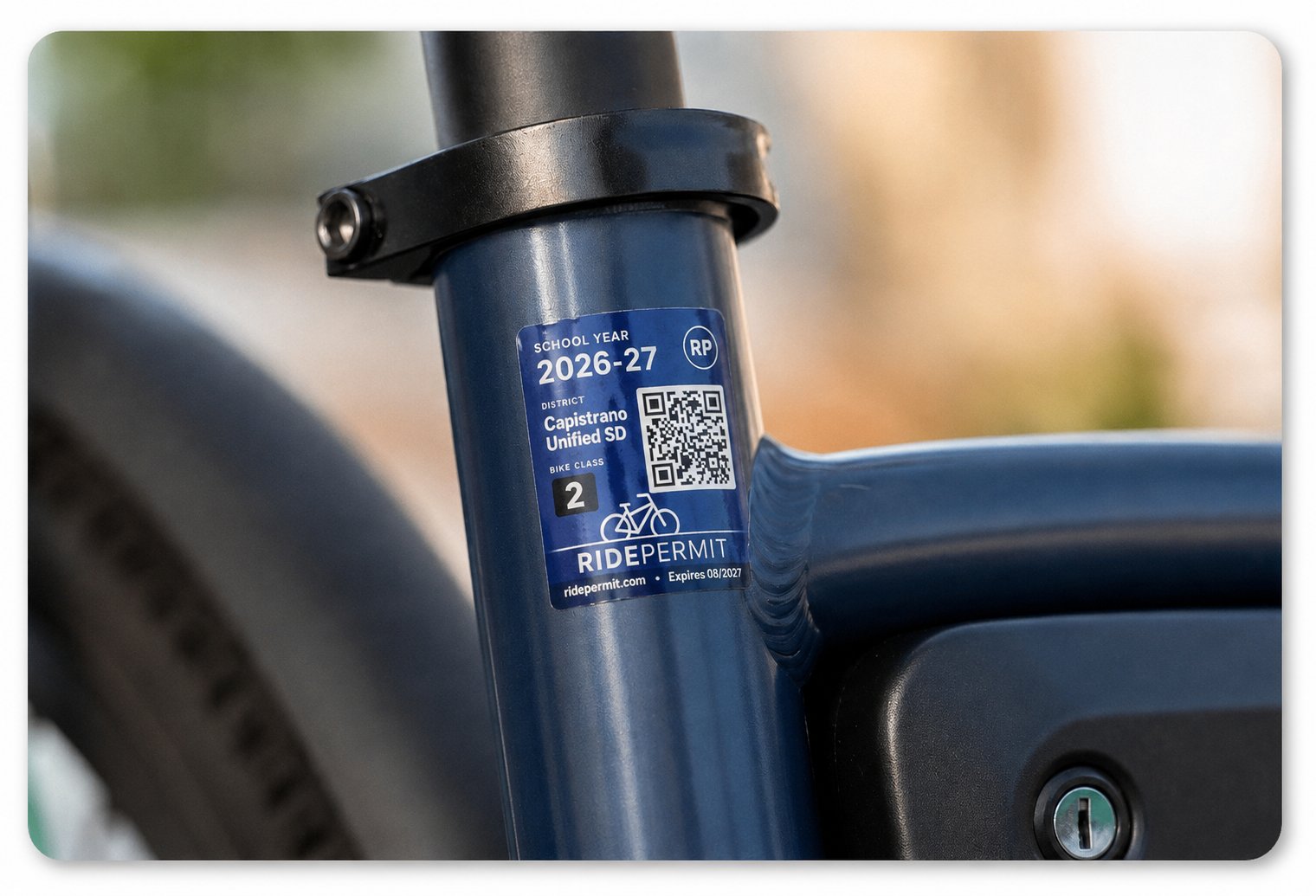 RidePermit e-bike permit decal with QR code mounted on a bike frame.